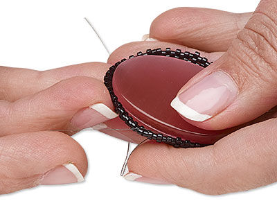 Inserting cabochon